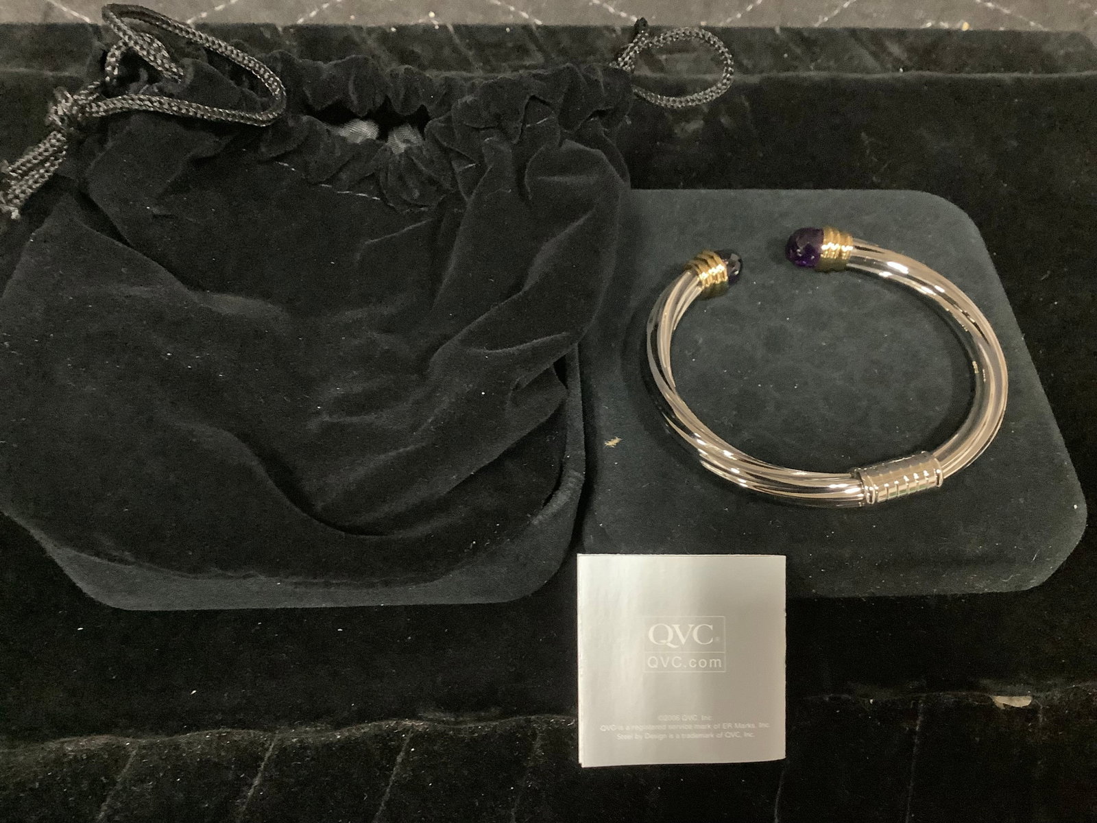 Steel by Design 9.20 ct tw Amethyst Twisted Bangle: Steel by Design 9.20 ct tw Amethyst Twisted Bangle