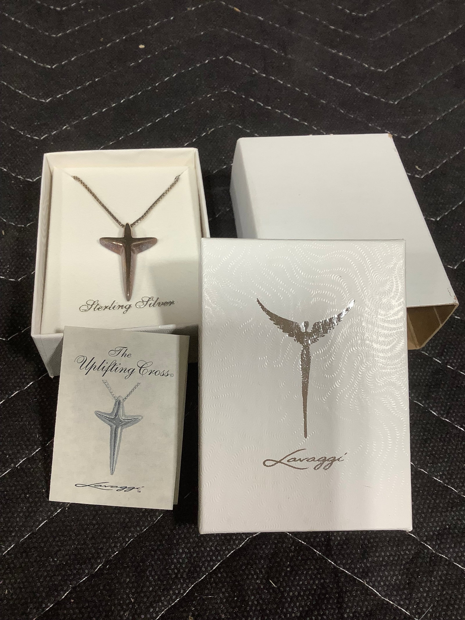 Uplifting fluid cross pendant on 18'' chain by Steven Lavaggi (1 of 1)
