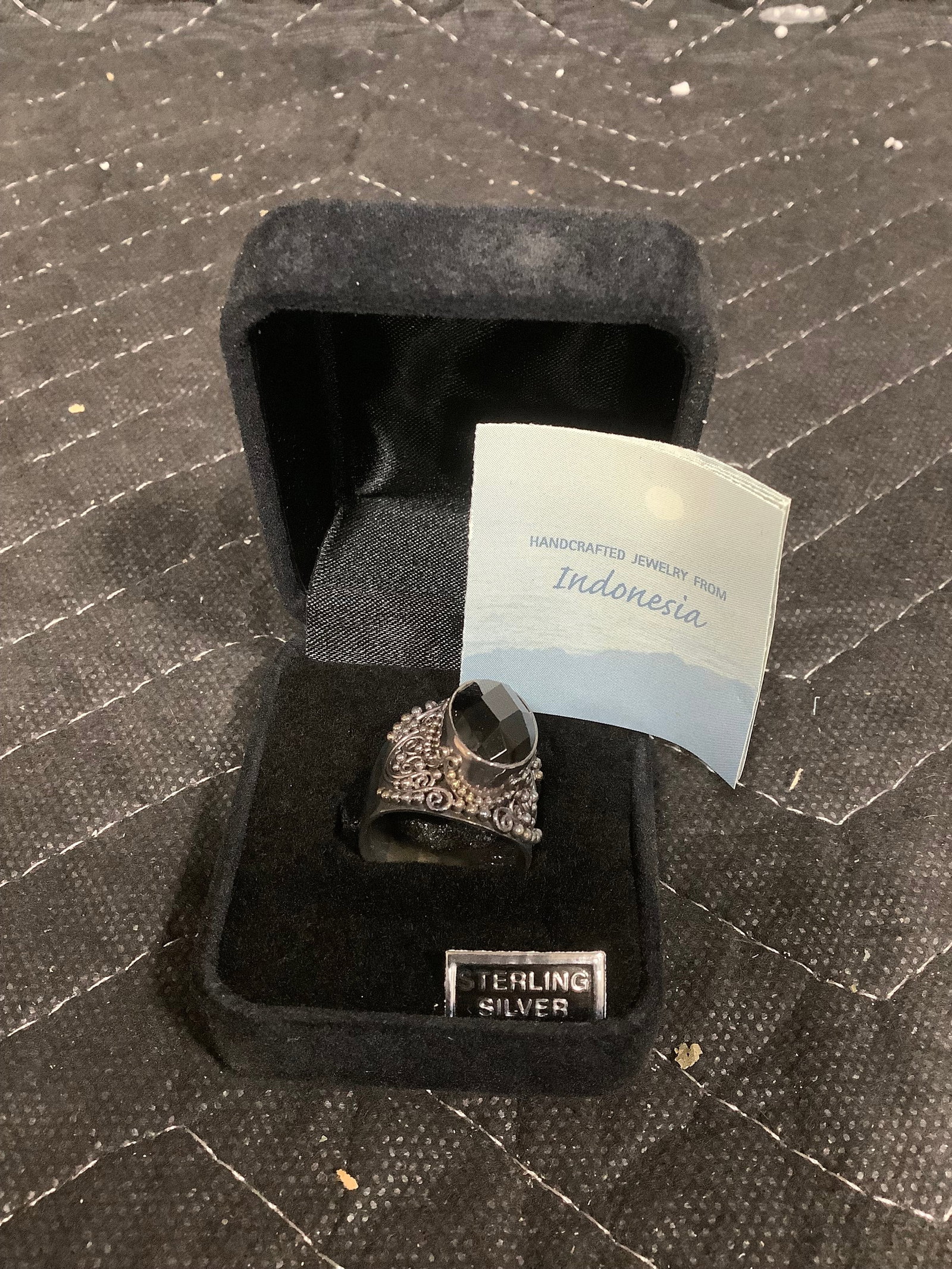 Artisan crafted sterling faceted black onyx scroll ring(8): Artisan crafted sterling faceted black onyx scroll ring(8)