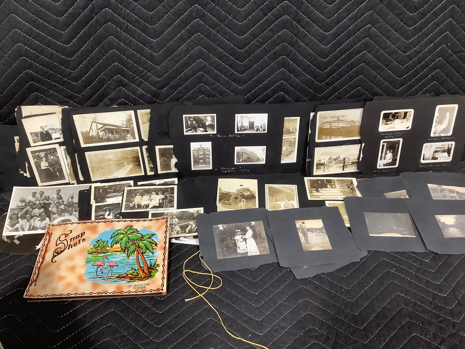 Vintage scrapbook pages with black and white photographs: Vintage scrapbook pages with black and white photographs