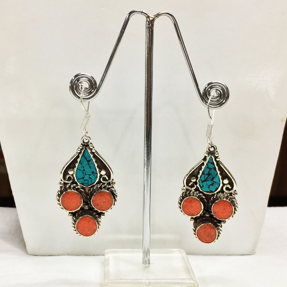 Tibetan Buddhist Turquoise & Coral Earring: Incredible one of a kind pieces for all occasions. Great for yourself, gifts for friends, or even to sell in your own store!! We are now offering wholesale prices! Item: Antique Tibetan Handnad
