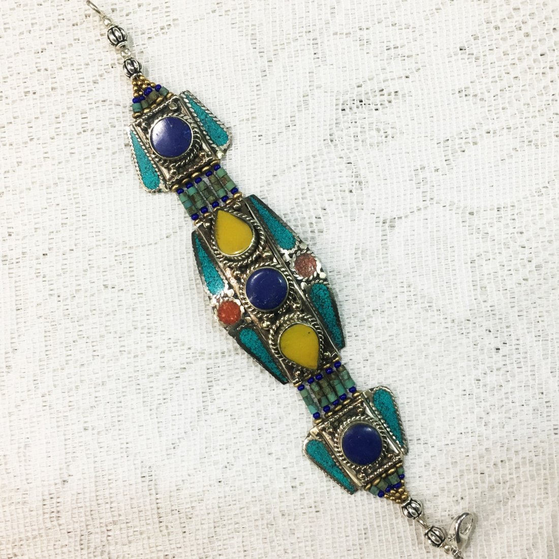 Tibetan Buddhist Amber & Coral Vintage Bracelet: Incredible one of a kind pieces for all occasions. Great for yourself, gifts for friends, or even to sell in your own store!! We are now offering wholesale prices! Item: Antique Tibetan Handnad