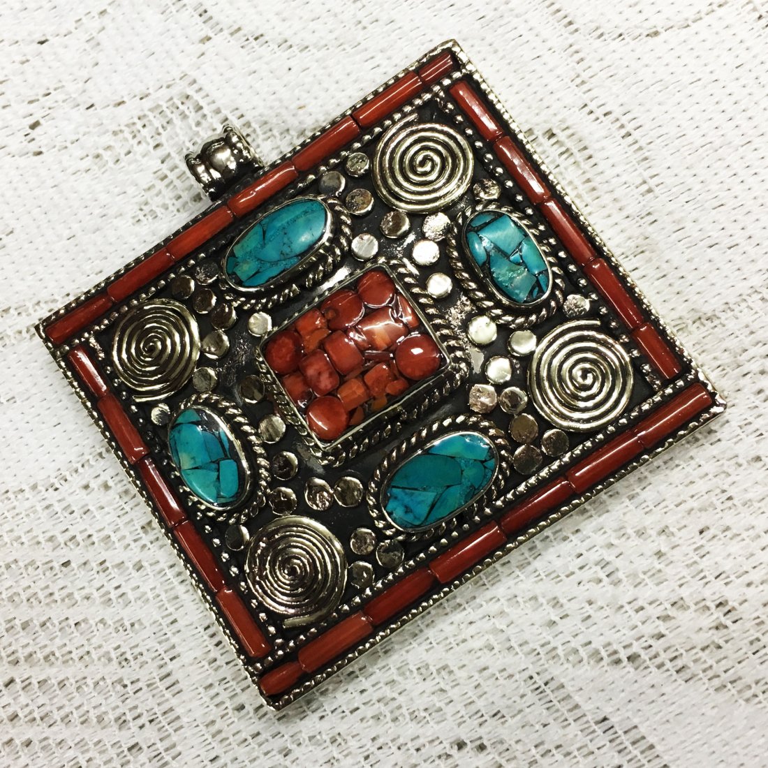 Nepalese Tibetan Silver Handmade Penadant: Incredible one of a kind pieces for all occasions. Great for yourself, gifts for friends, or even to sell in your own store!! We are now offering wholesale prices! Item: Antique Tibetan Handnad
