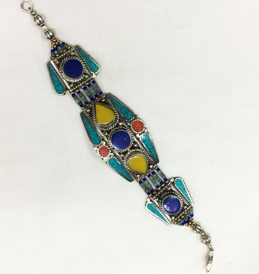 Tibetan Buddhist Turquoise & Coral Vintage Bracelet: Incredible one of a kind pieces for all occasions. Great for yourself, gifts for friends, or even to sell in your own store!! We are now offering wholesale prices! Item: Antique Tibetan Handmad