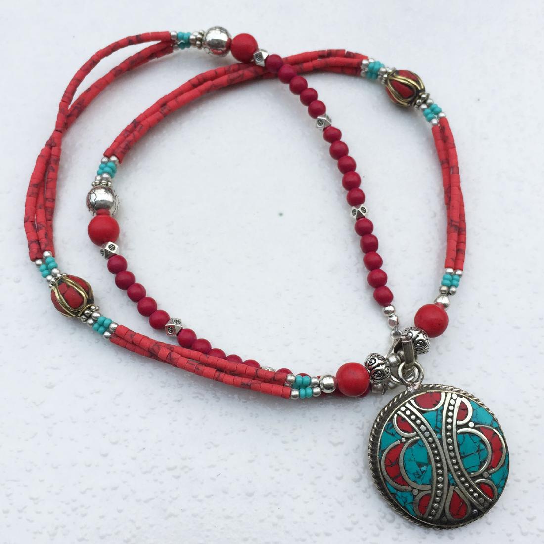 Tibetan Turquoise & Coral Handmade Pendant Necklace: Tibetan Turquoise & Coral Handmade Pendant Necklace Material: Stones Size: 18-20 inch Weight: 35 grams Approx Country/Region of Manufacture: Nepal