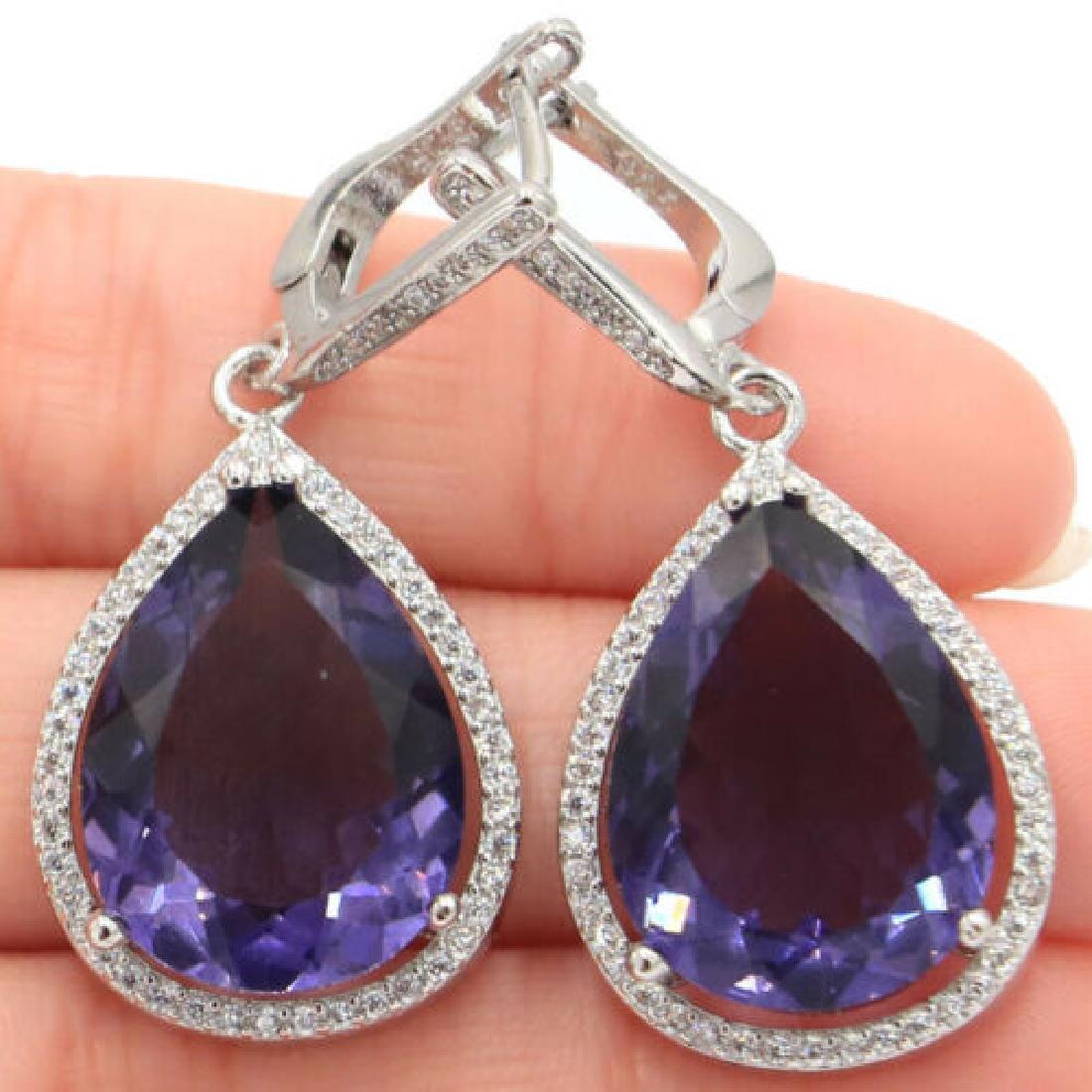 17.1g Drop 20x15mm Spinel Natural CZ Sterling Silver: Face Earrings:43x19 mm or 1.7x0.7 inch Gemstone size:20x15mm Treatment: Heated Clarity: IF to VVS Others: Elegant, simply and beautiful!! Luster: Attractive