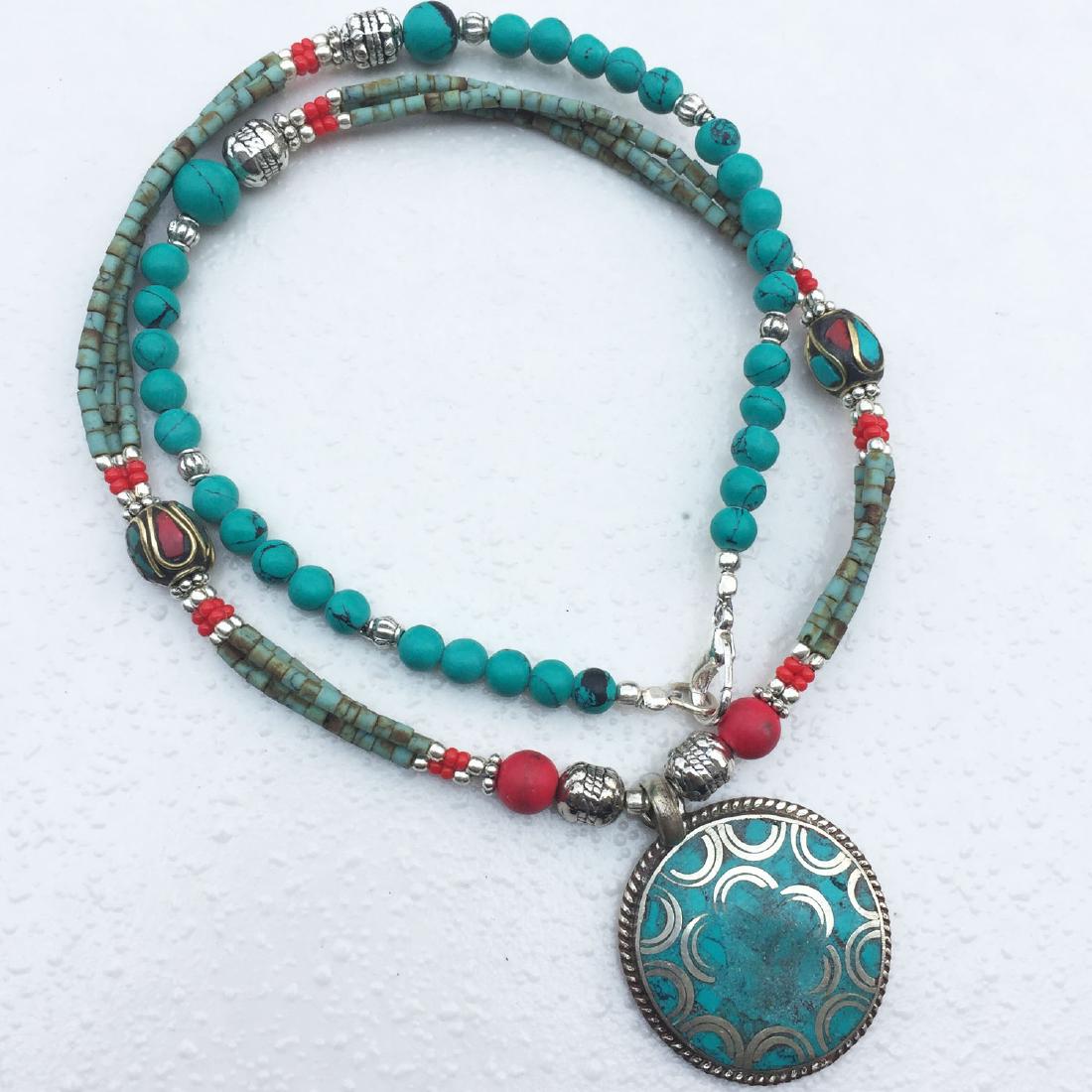 Tibetan Turquoise & Coral Handmade Pendant Necklace: Tibetan Turquoise & Coral Handmade Pendant Necklace Material: Stones Size: 18-20 inch Weight: 35 grams Approx Country/Region of Manufacture: Nepal