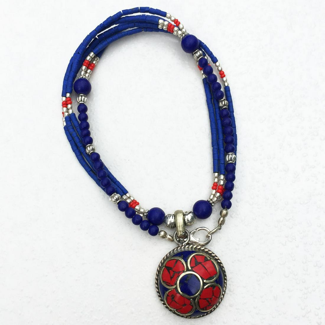 Tibetan Turquoise & Coral Handmade Pendant Necklace: Tibetan Turquoise & Coral Handmade Pendant Necklace Material: Stones Size: 18-20 inch Weight: 35 grams Approx Country/Region of Manufacture: Nepal