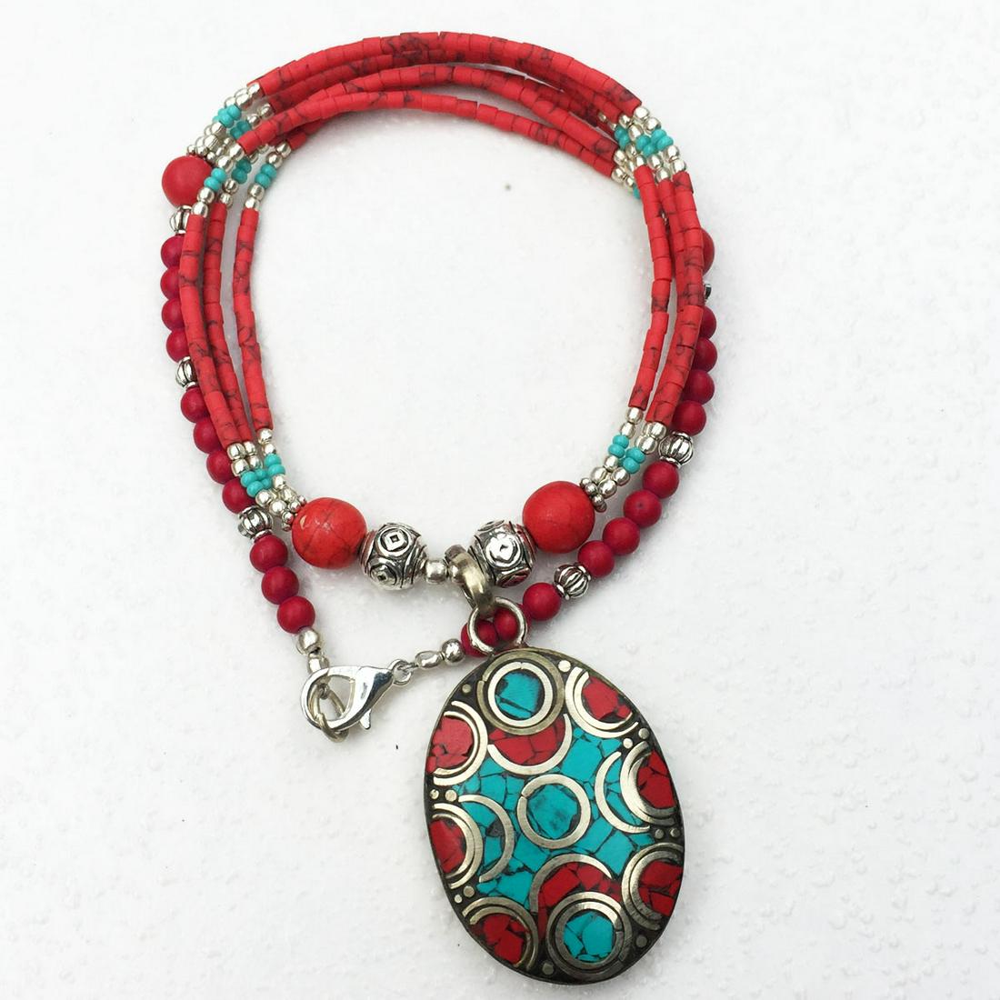 Tibtan Natural Coral Handmade Pendant Necklace: Tibetan Turquoise & Coral Handmade Pendant Necklace Material: Stones Size: 18-20 inch Weight: 35 grams Approx Country/Region of Manufacture: Nepal