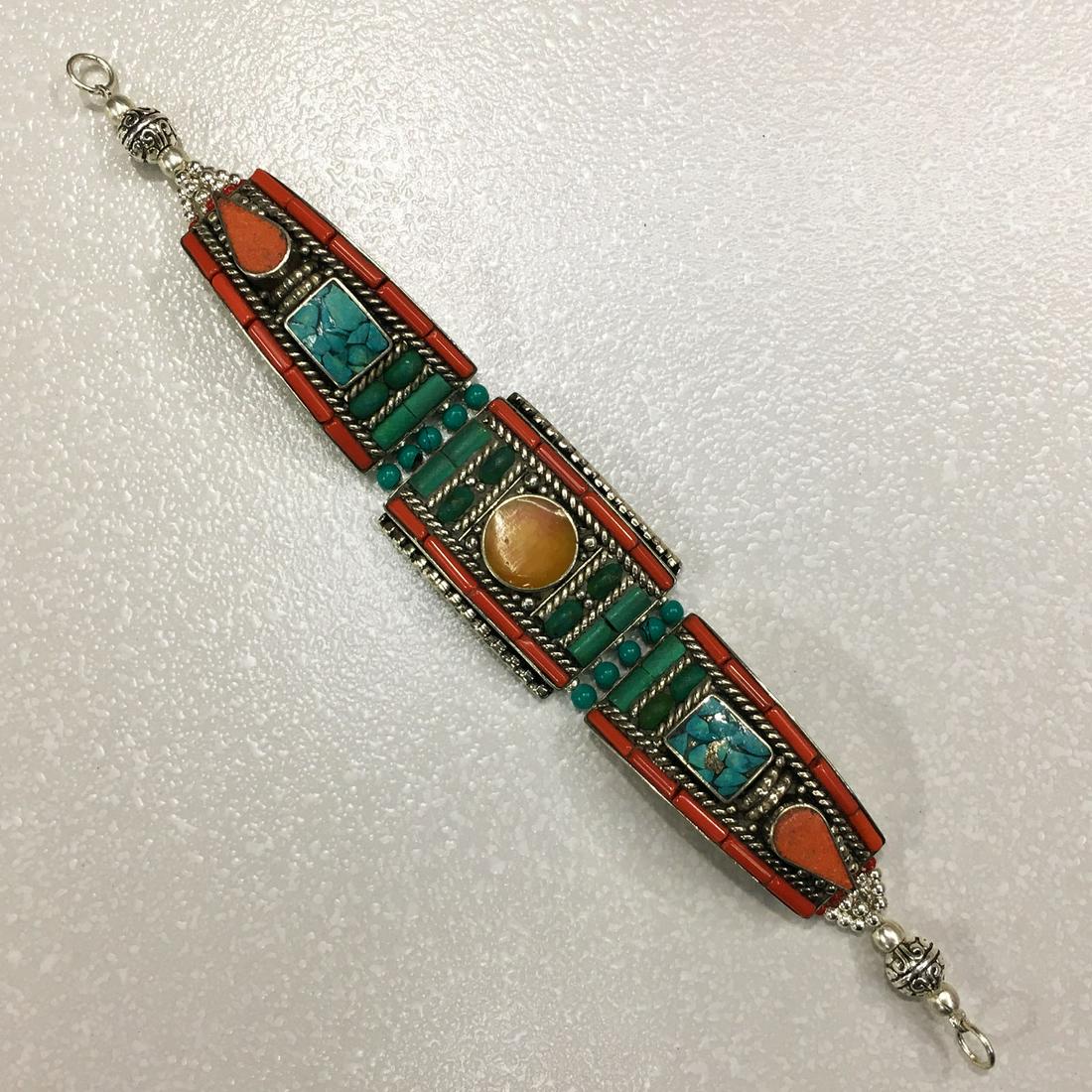 Tibetan Handmade Turquoise & Amber Ethnic Bracelet: TIBETAN TURQUOISE & CORAL HANDMADE BRACELET Weight: 35 Gram Approx Gemstones: Turquoise & Coral, Lapis Brand: Handmade Bracelet Length: 6 to 7 Inch Country/Region of Manufacture: Kathmandu/Nepal