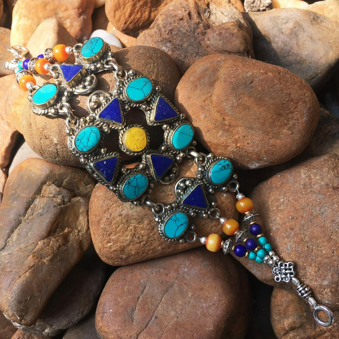 TIBETAN AMBER & TURQUOISE HANDMADE BRACELET: TIBETAN AMBER & TURQUOISE HANDMADE BRACELET Weight: 35 Gram Approx Gemstones: Turquoise & Coral, Lapis Brand: Handmade Bracelet Length: 6 to 7 Inch Country/Region of Manufacture: Kathmandu/Nepal