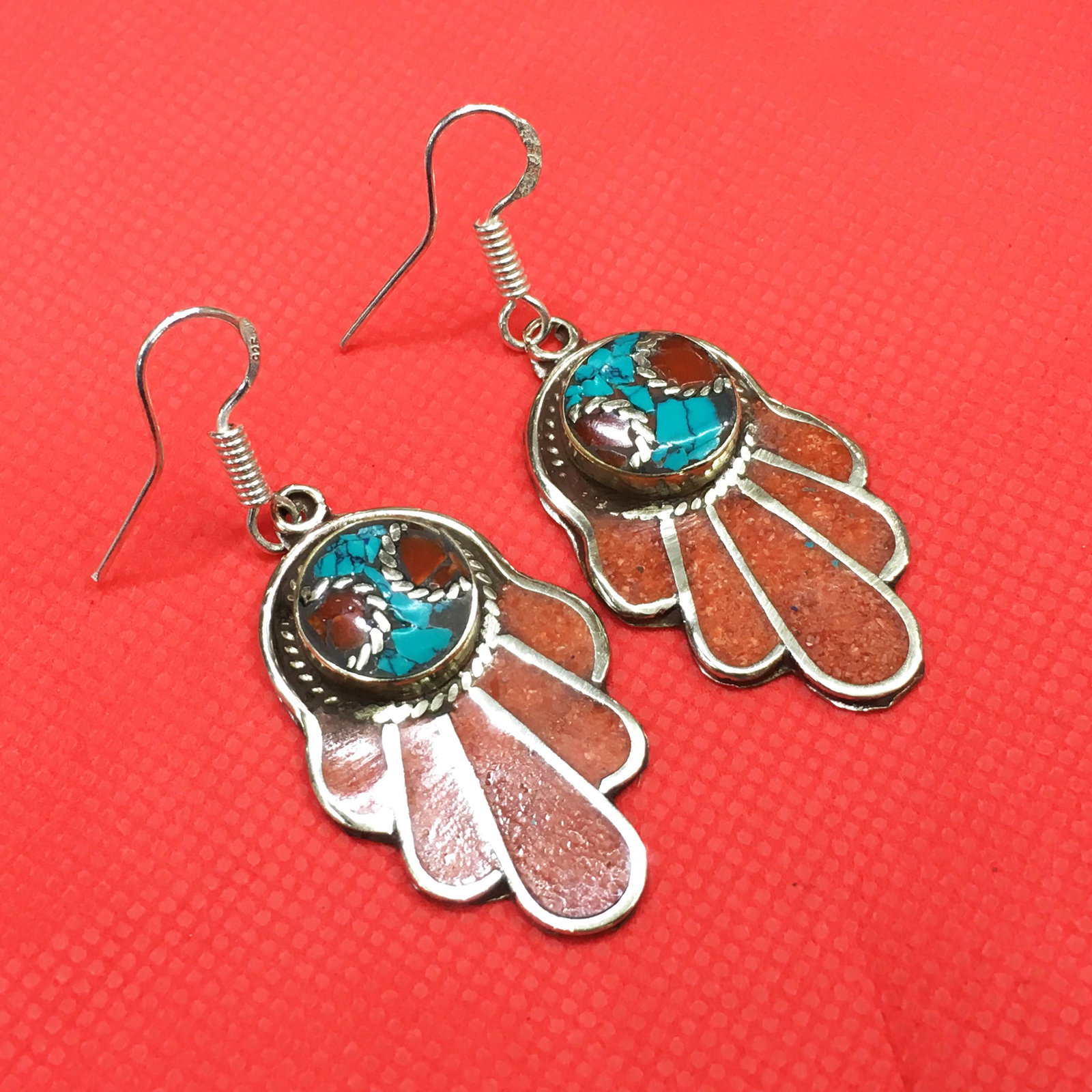 Tibetan Turquoise & Coral Handmade Fatima Hand Earrings: Tibetan Handmade Ethnic Earrings Main Stone: Turquoise, Coral & Lapis Metal: Tibetan Silver Material: Stone Brand: Handmade Style: Bohemian Ethnic Origin: Tibetan Country/Region of Manufacture: Nepal
