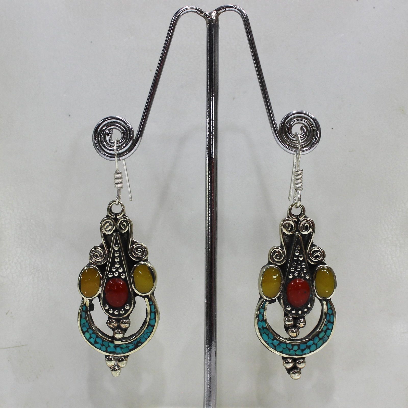 Tibetan Turquoise & Coral Handmade Ethnic Earrings: Tibetan Handmade Ethnic Earrings Main Stone: Turquoise, Coral & Lapis Metal: Tibetan Silver Material: Stone Brand: Handmade Style: Bohemian Ethnic Origin: Tibetan Country/Region of Manufacture: Nepal