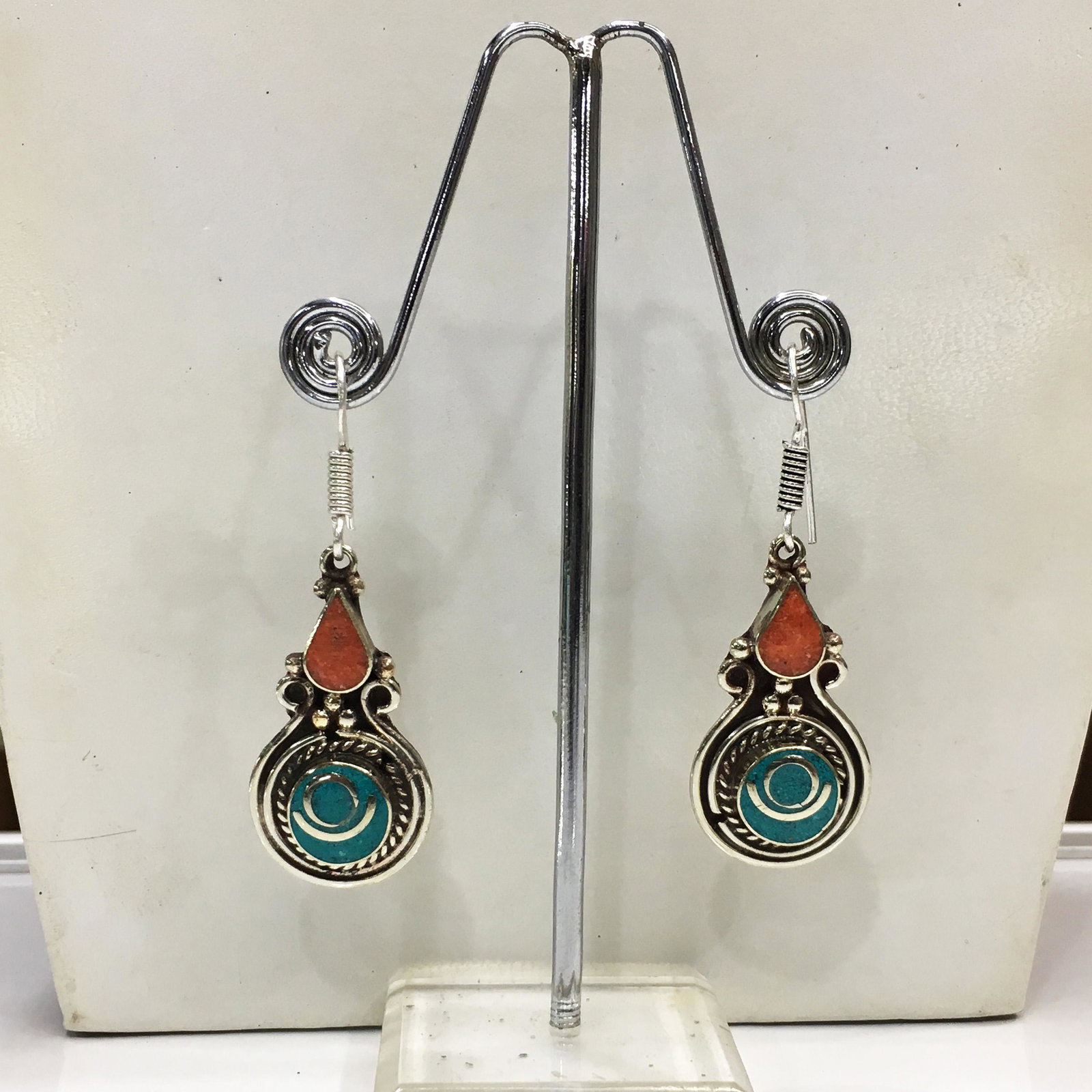Tibetan Turquoise & Coral Handmade Ethnic Earrings: Tibetan Handmade Ethnic Earrings Main Stone: Turquoise, Coral & Lapis Metal: Tibetan Silver Material: Stone Brand: Handmade Style: Bohemian Ethnic Origin: Tibetan Country/Region of Manufacture: Nepal