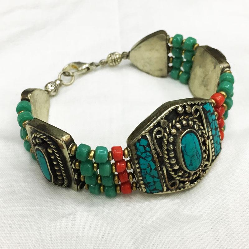 Tibetan Turquoise Handmade Boho Bracelet: TIBETAN TURQUOISE & CORAL HANDMADE BRACELET Weight: 35 Gram Approx Gemstones: Turquoise & Coral, Lapis Brand: Handmade Bracelet Length: 6 to 7 Inch Country/Region of Manufacture: Kathmandu/Nepal