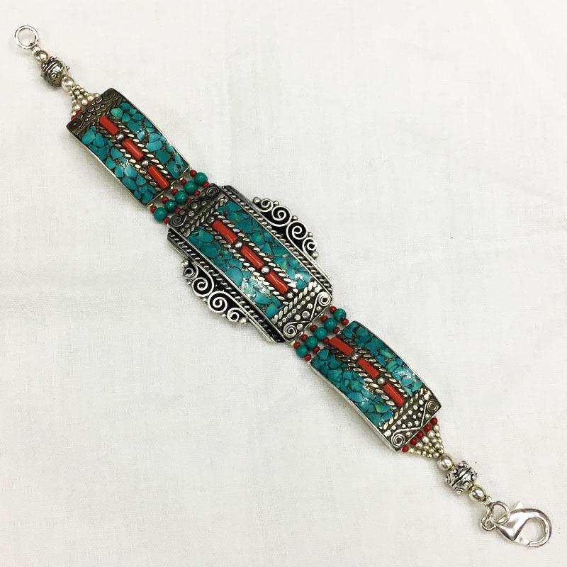Tibetan Turquoise Handmade Boho Bracelet: TIBETAN TURQUOISE & CORAL HANDMADE BRACELET Weight: 35 Gram Approx Gemstones: Turquoise & Coral, Lapis Brand: Handmade Bracelet Length: 6 to 7 Inch Country/Region of Manufacture: Kathmandu/Nepal