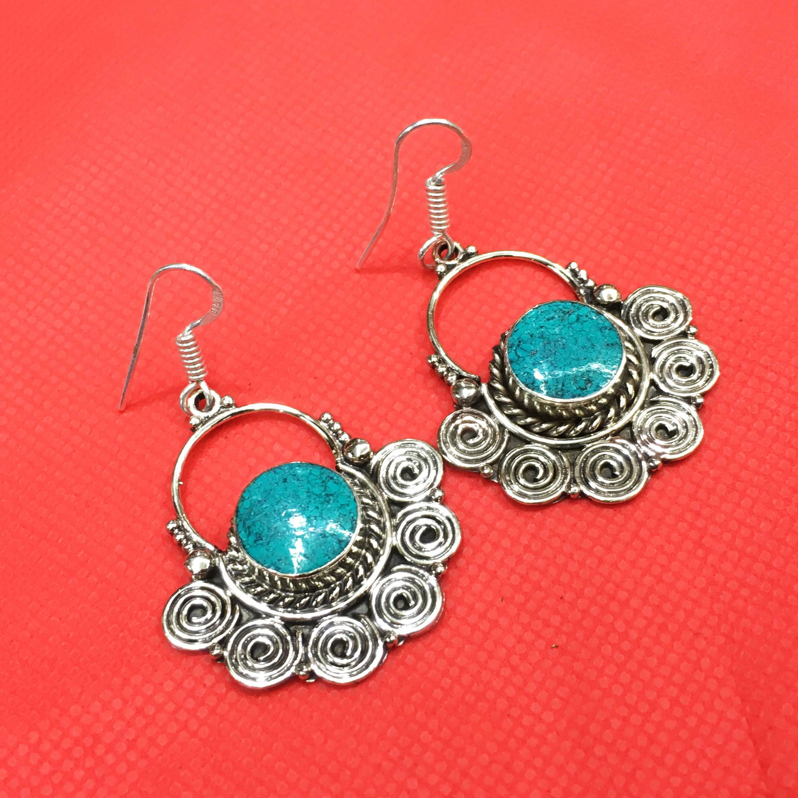 Tibetan Turquoise Handmade Ethnic Earrings: Tibetan Handmade Ethnic Earrings Main Stone: Turquoise, Coral & Lapis Metal: Tibetan Silver Material: Stone Brand: Handmade Style: Bohemian Ethnic Origin: Tibetan Country/Region of Manufacture: Nepal