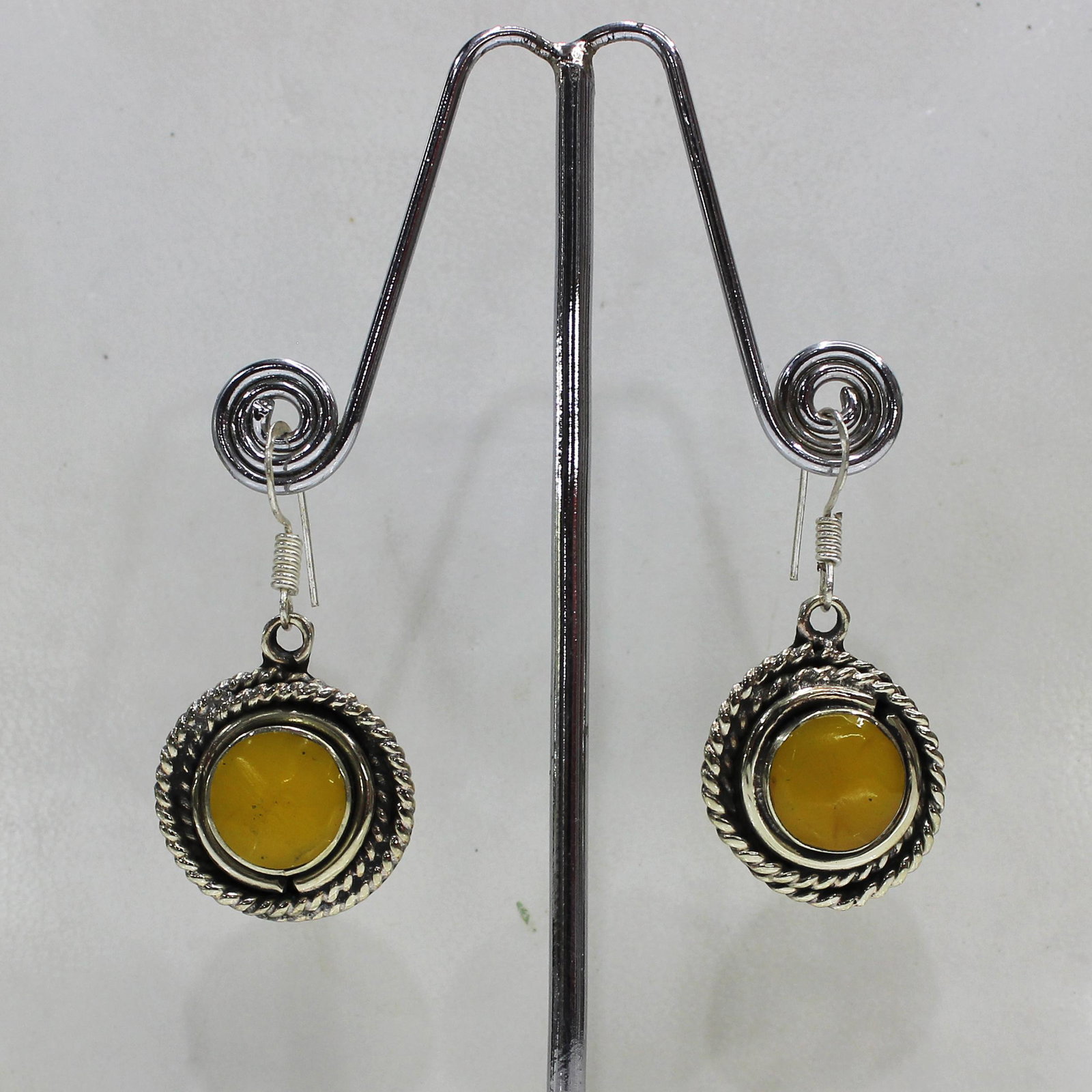Tibetan Amber Handmade Ethnic Earrings: Tibetan Handmade Ethnic Earrings Main Stone: Turquoise, Coral & Lapis Metal: Tibetan Silver Material: Stone Brand: Handmade Style: Bohemian Ethnic Origin: Tibetan Country/Region of Manufacture: Nepal