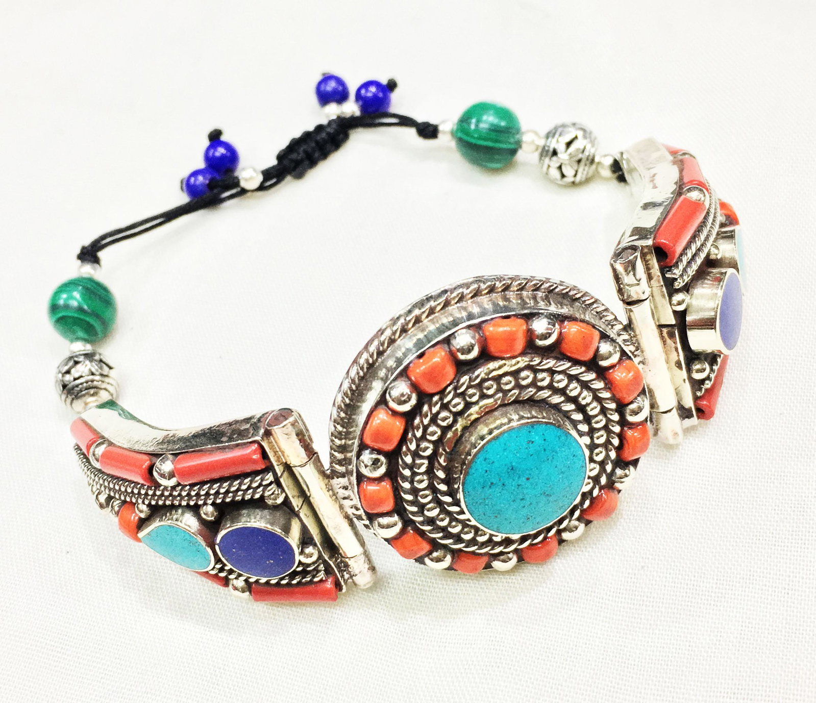 Tibetan Turquoise Unique Handmade String Bracelet: TIBETAN TURQUOISE & CORAL HANDMADE BRACELET Weight: 35 Gram Approx Gemstones: Turquoise & Coral, Lapis Brand: Handmade Bracelet Length: 6 to 7 Inch Country/Region of Manufacture: Kathmandu/Nepal