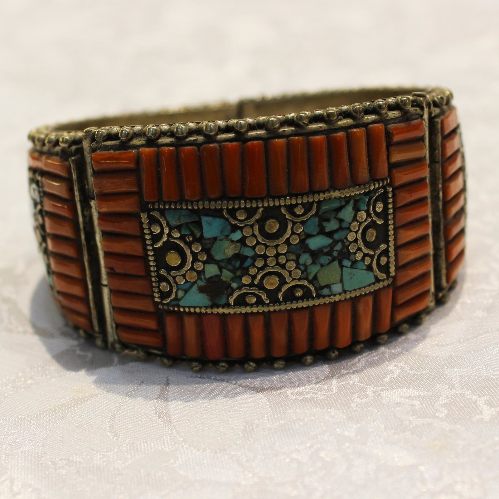 Ethnic Turquoise & Coral Handmade Old Bangle: TIBETAN TURQUOISE & CORAL HANDMADE BANGLE Weight: 100 Gram Approx Gemstones: Turquoise & Coral, Lapis Brand: Handmade Bangle Length: 6 to 7 Inch Country/Region of Manufacture: Kathmandu/Nepal