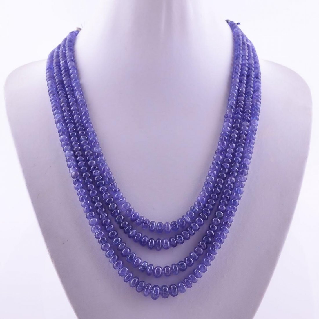 705 Ct. Supreme AAA Quality 100% Natural Tanzanite: 705 Ct. Supreme AAA Quality 100% Natural Tanzanite Rondelle Shape Smooth Beads Adjustable Necklace 6X4 9X6 mm(Measurement & weight are close to approximations.)Size: 6X4 9X6 mm ApproxLength:16"inch