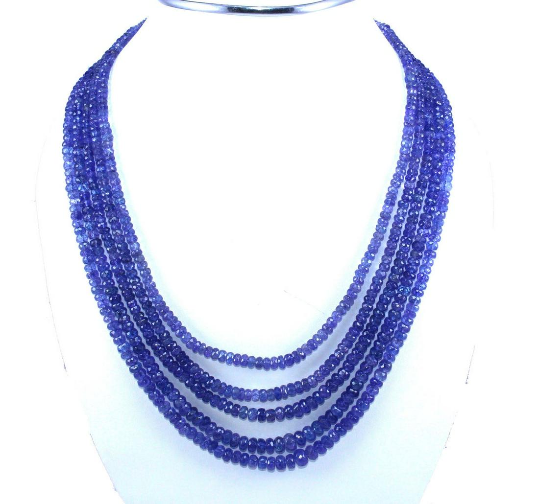 Natural Tanzanite 5 Strands 22" with Silver Claps: AA Quality Natural Tanzanite 3 to 7 mm Faceted Rondelle Beads 5 Strands 22 Inches Long with Silver Claps NecklaceStone : TanzaniteWeight : 548.05 caratsLength : 22 inchesSize : 3mm to 7mm