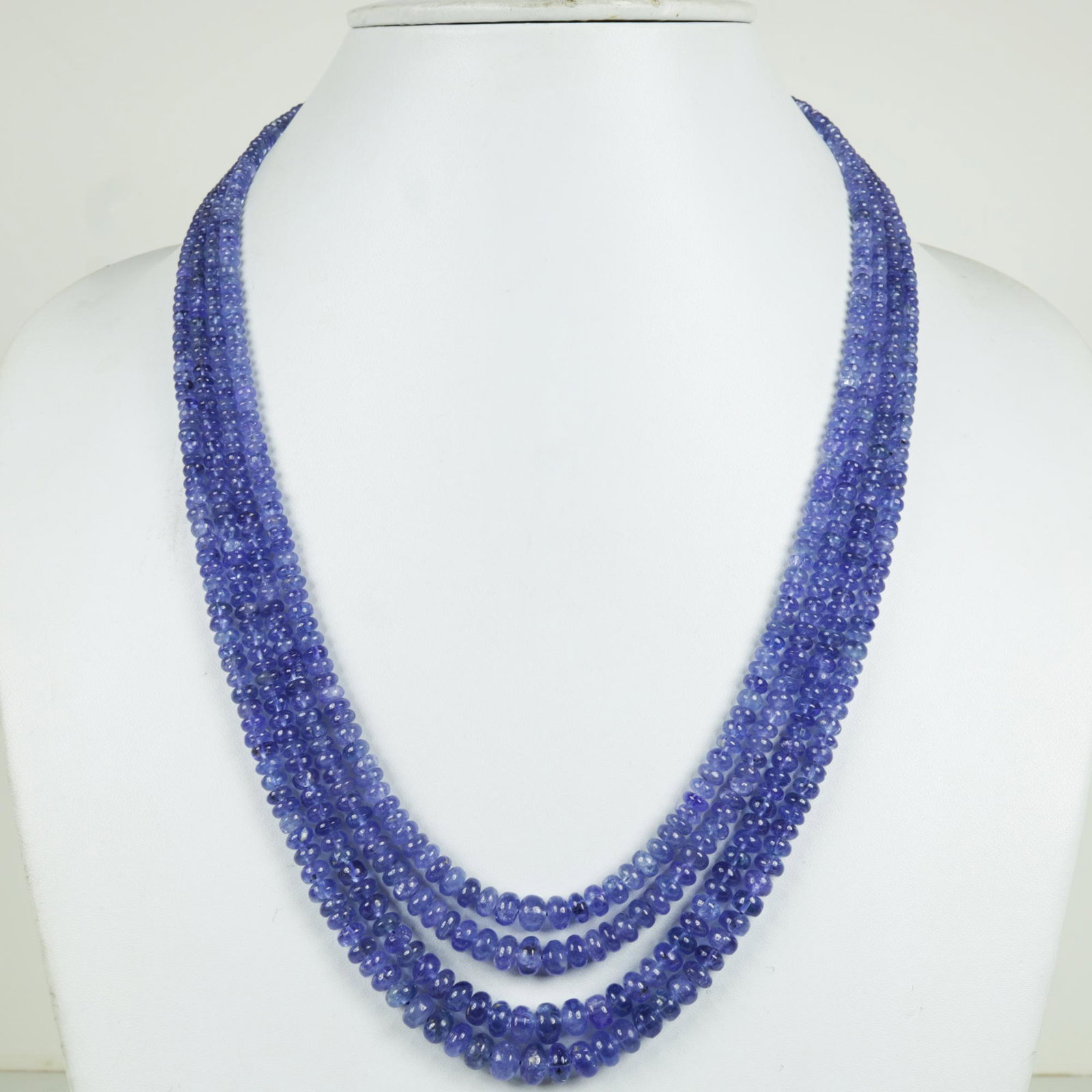411 Carat Natural Tanzanite Plane Beads Necklace: 411 Carat Natural Tanzanite Plane Beads NecklaceIf Buyer want in Silver Clasps, We'll make (Cost $10)GemStone: TanzaniteCondition: Brand newShape: Faceted RoundelCountry of Origin: TanzaniaCountry/Reg