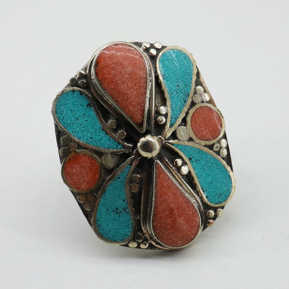 Tibetan Turquoise & Coral Handmade Ethnic Ring - Free: Tibetan Turquoise & Coral Handmade Ethnic Ring - Free SizeWeight: 20 Gram ApproxGemstones: Turquoise & CoralBrand: HandmadeSize: Free SizeCountry/Region of Manufacture: Nepal