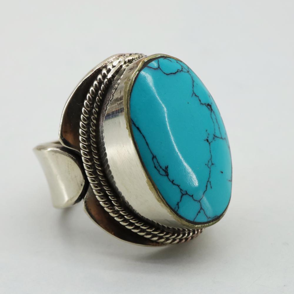 Tibetan Turquoise Handmade Ethnic Chokar Ring - Free: Tibetan Turquoise Handmade Ethnic Ring - Free SizeWeight: 20 Gram ApproxGemstones: TurquoiseBrand: HandmadeSize: Free SizeCountry/Region of Manufacture: Nepal