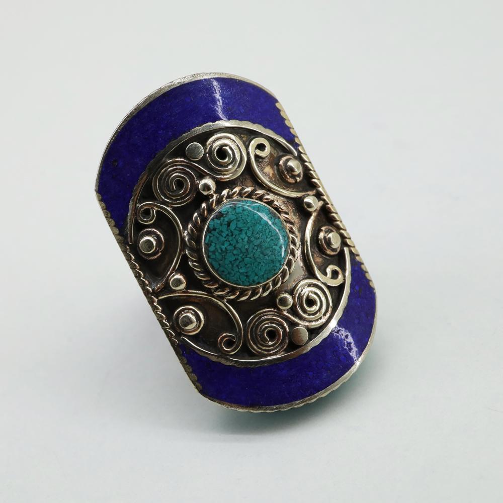 Tibetan Turquoise & Lapis Handmade Ethnic Ring - Free: Tibetan Turquoise & Lapis Handmade Ethnic Ring - Free SizeWeight: 20 Gram ApproxGemstones: Turquoise & LapisBrand: HandmadeSize: Free SizeCountry/Region of Manufacture: Nepal