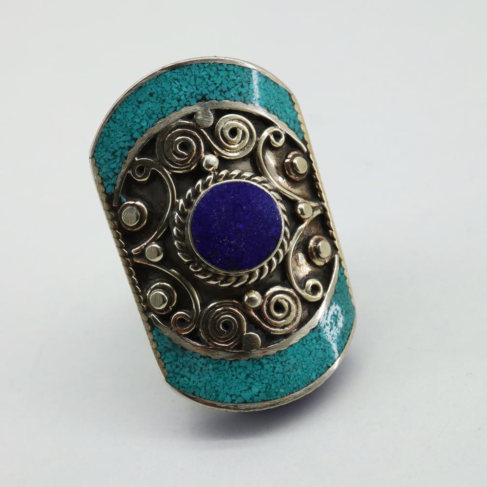 Tibetan Turquoise & Lapis Handmade Ethnic Ring - Free: Tibetan Turquoise & Lapis Handmade Ethnic Ring - Free SizeWeight: 20 Gram ApproxGemstones: Turquoise & LapisBrand: HandmadeSize: Free SizeCountry/Region of Manufacture: Nepal