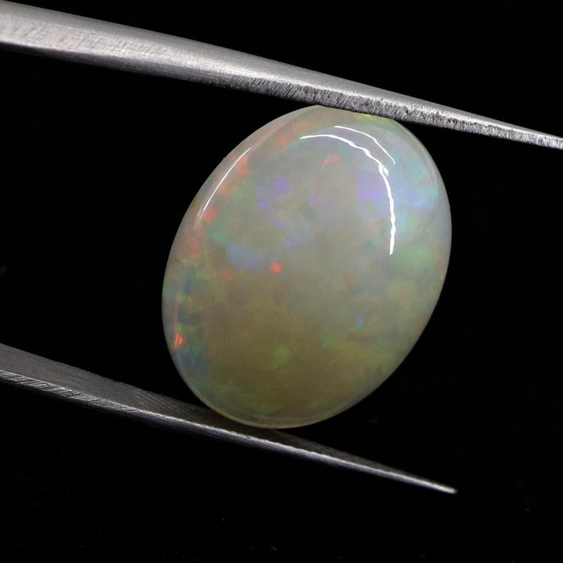 11.81 CTS Natural Ethiopian Opal - 20X15.5X8.1 MM (1 of 7)
