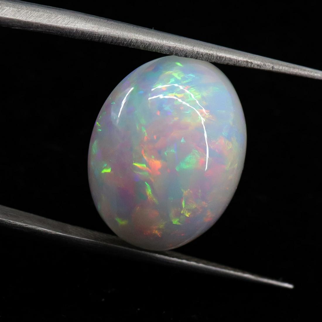 8.23 CTS Natural Ethiopian Opal - 16X12.5X8.5 MM (1 of 10)
