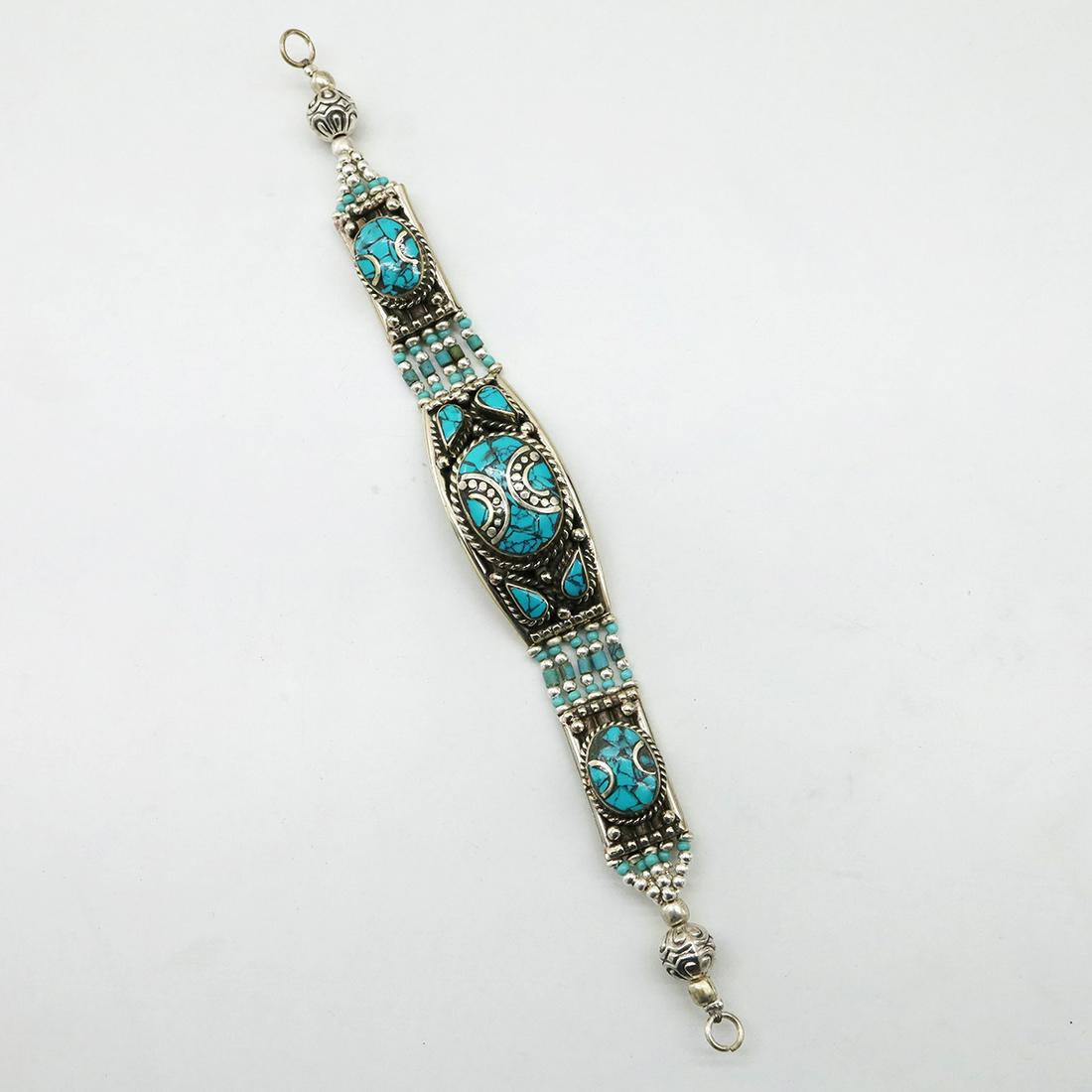 Natural Turquoise Handmade Beaded Bracelet: Tibet Natural Stone Hand Made Turquoise, Coral & Lapis Bracelet......This elegant Bracelet was handcrafted in Tibet, the home of exquisite jewelry craftsmanship. It was skillfully made with large natu