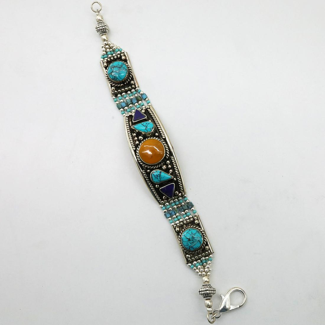 Natural Turquoise Handmade Choker Bracelet: Tibet Natural Stone Hand Made Turquoise, Coral & Lapis Bracelet......This elegant Bracelet was handcrafted in Tibet, the home of exquisite jewelry craftsmanship. It was skillfully made with large natu