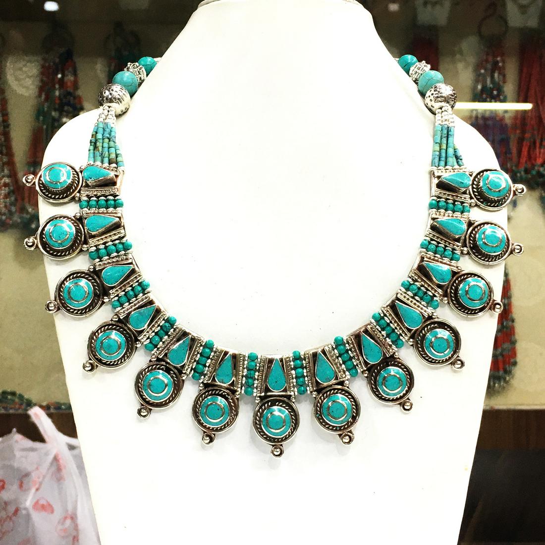 Tibetan Turquoise Handmade Choker Necklace: Turquoise encourages growth, development, and positive change within one's life. It is especially useful for clearing the Throat Chakra, and blockages of suppressed self-expression. Coral symbolizes l