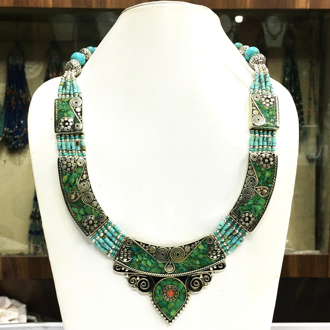 Natural Turquoise Handmade Ethnic Choker Necklace: Turquoise encourages growth, development, and positive change within one's life. It is especially useful for clearing the Throat Chakra, and blockages of suppressed self-expression. Coral symbolizes l
