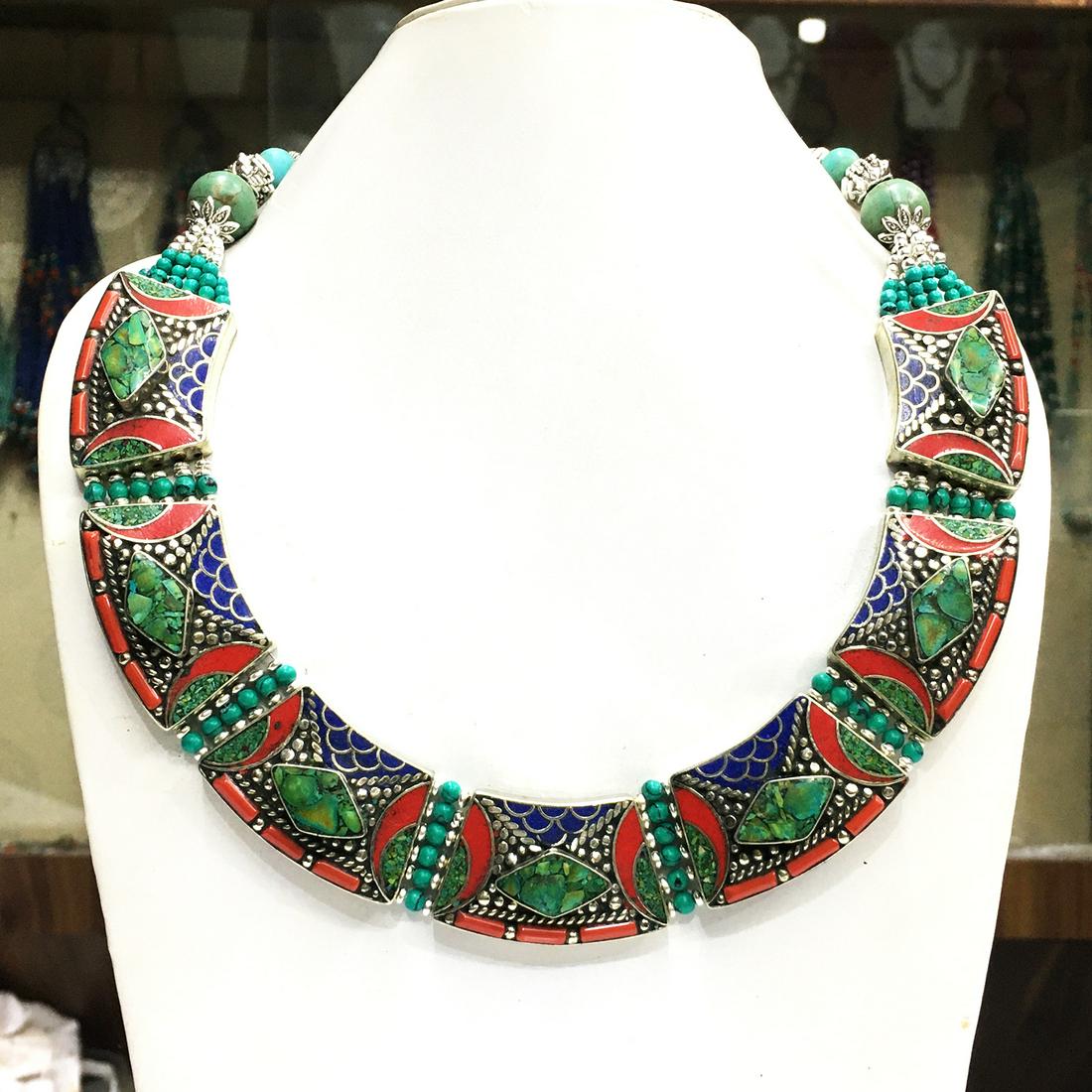 Natural Turquoise Handmade Tribal Choker Necklace: Turquoise encourages growth, development, and positive change within one's life. It is especially useful for clearing the Throat Chakra, and blockages of suppressed self-expression. Coral symbolizes l