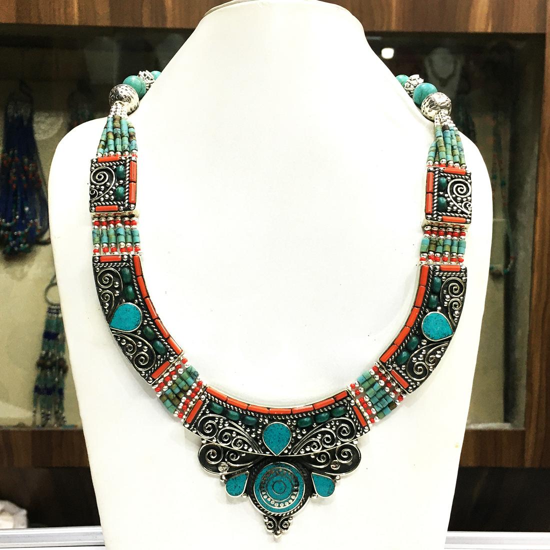 Tibetan Turquoise Handmade Choker Necklace: Turquoise encourages growth, development, and positive change within one's life. It is especially useful for clearing the Throat Chakra, and blockages of suppressed self-expression. Coral symbolizes l