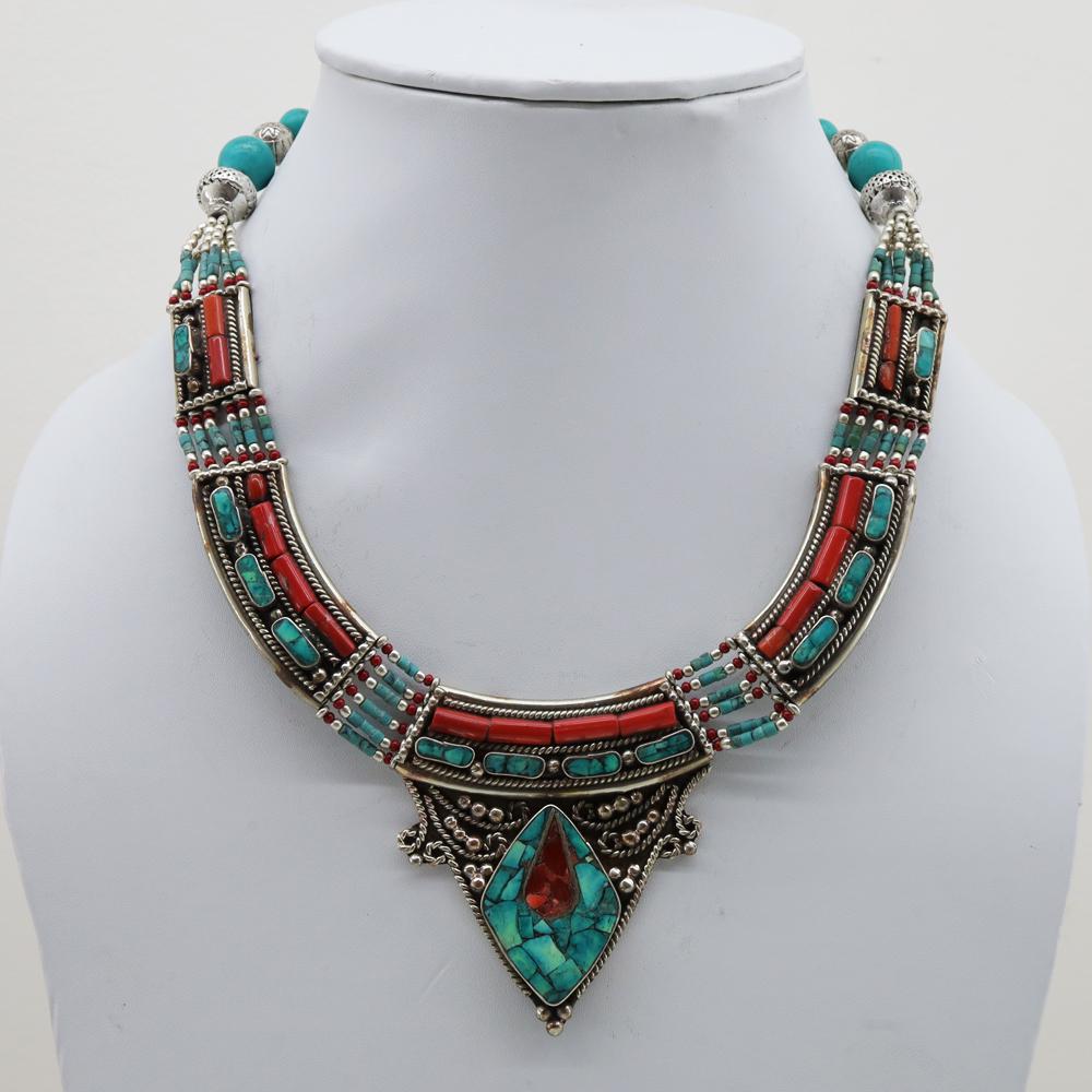 Tibetan Turquoise Handmade Choker Necklace: Turquoise encourages growth, development, and positive change within one's life. It is especially useful for clearing the Throat Chakra, and blockages of suppressed self-expression. Coral symbolizes l