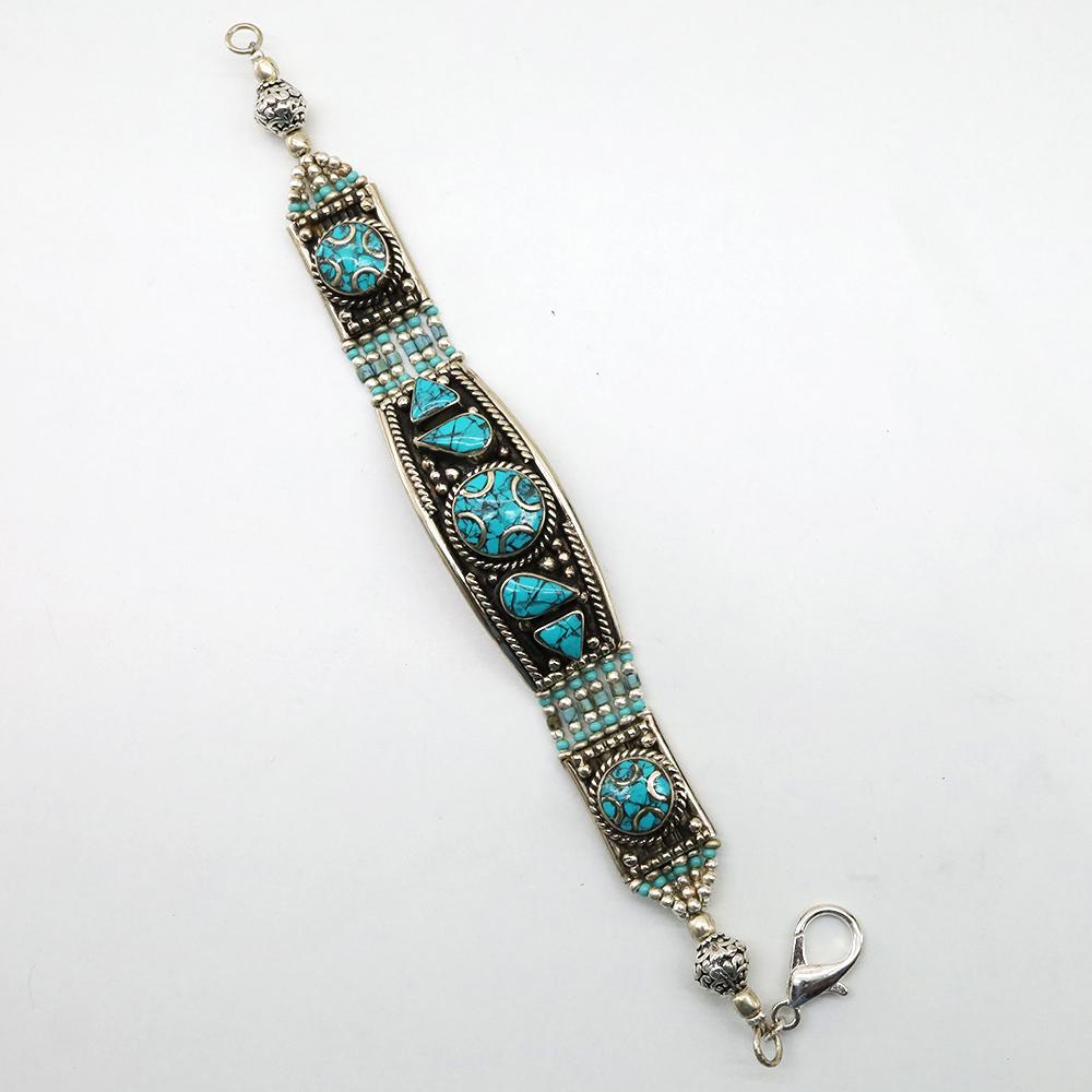 Ethnic Tibetan Turquoise Handmade Bracelet: TIBETAN TURQUOISE & CORAL HANDMADE BRACELETWeight: 30 Gram ApproxGemstones: Turquoise & Coral, LapisBrand: HandmadeBracelet Length: 6 to 7 InchCountry/Region of Manufacture: Kathmandu/Nepal