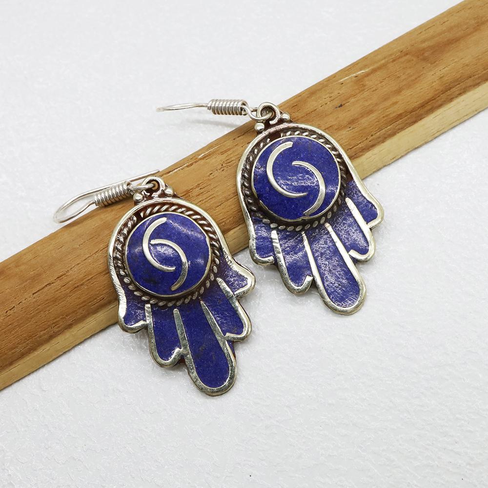 Tibetan Lapis Fatima hand Handmade Earring: Tibetan Handmade Ethnic EarringsMain Stone: Turquoise, Coral & LapisMetal: Tibetan SilverMaterial: StoneBrand: HandmadeStyle: BohemianEthnic Origin: TibetanCountry/Region of Manufacture: Nepal