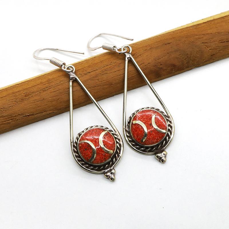 Tibetan Coral Handmade Chokar Earrings: Tibetan Handmade Ethnic EarringsMain Stone: LapisMetal: Tibetan SilverMaterial: StoneBrand: HandmadeStyle: BohemianEthnic Origin: TibetanCountry/Region of Manufacture: Nepal