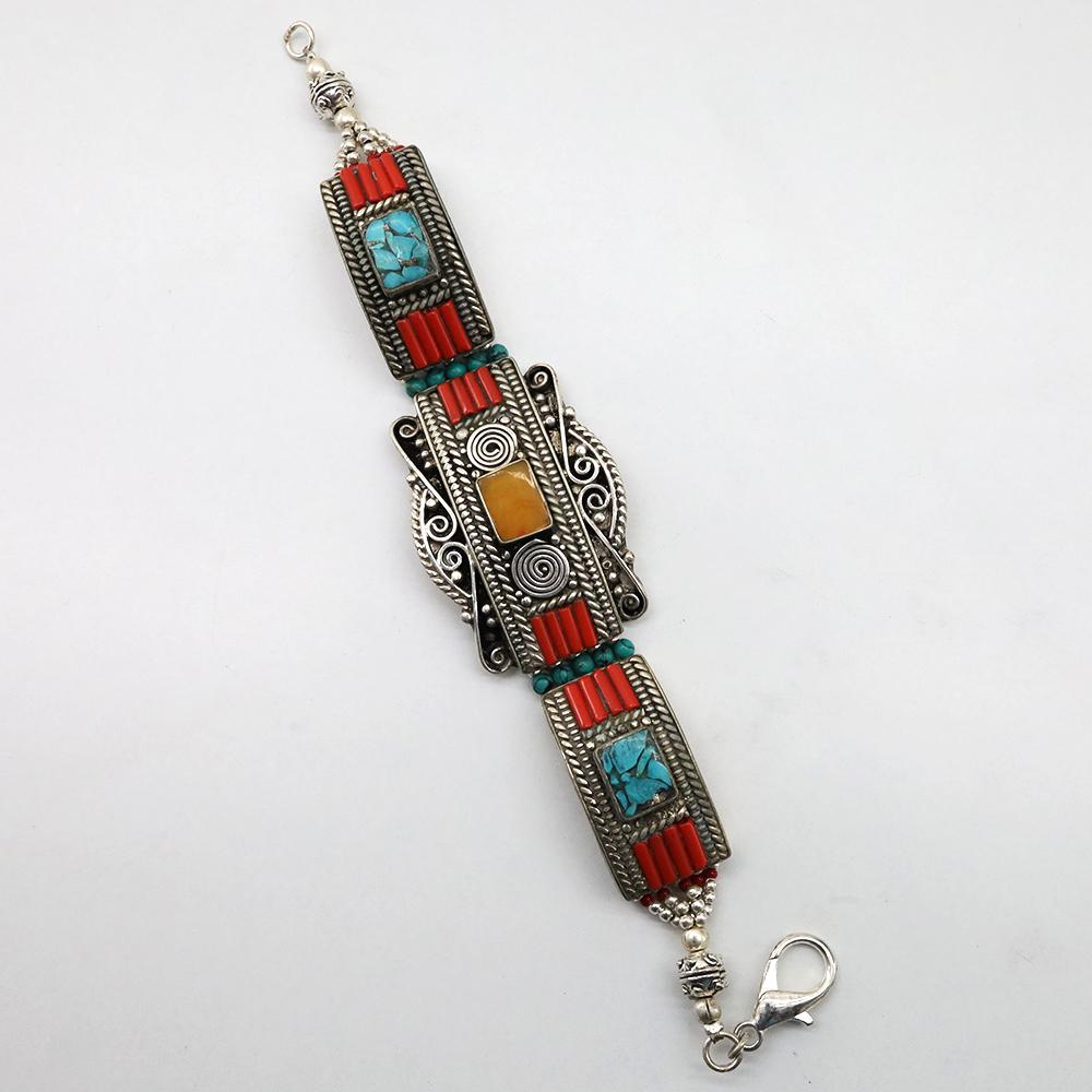 Ethnic Tibetan Turquoise Handmade Bracelet: TIBETAN TURQUOISE & CORAL HANDMADE BRACELETWeight: 30 Gram ApproxGemstones: Turquoise & Coral, LapisBrand: HandmadeBracelet Length: 6 to 7 InchCountry/Region of Manufacture: Kathmandu/Nepal