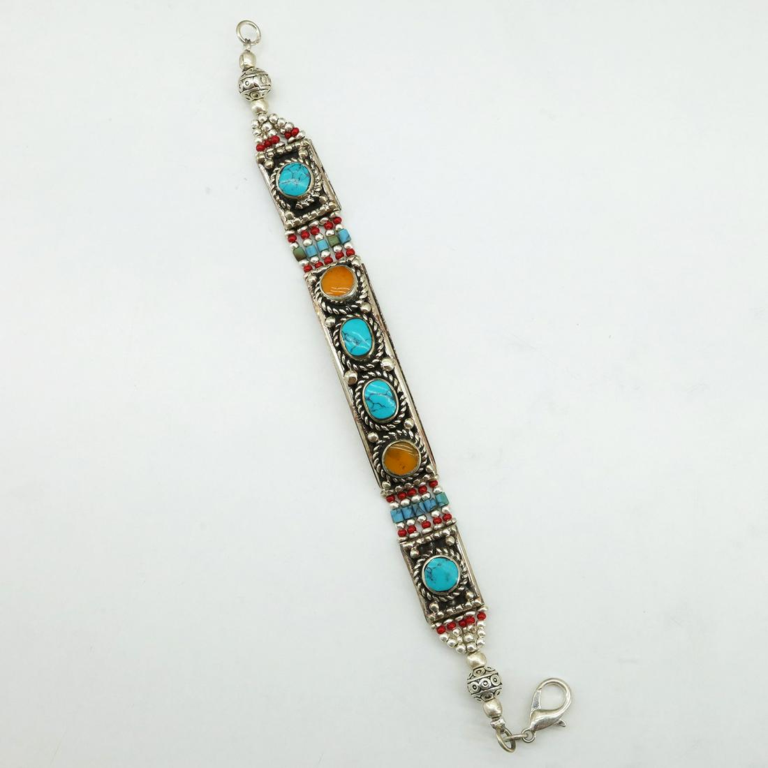 Ethnic Turquoise & Lapis Handmade Choker Bracelet: TIBETAN TURQUOISE & CORAL HANDMADE BRACELETWeight: 30 Gram ApproxGemstones: Turquoise & Coral, LapisBrand: HandmadeBracelet Length: 6 to 7 InchCountry/Region of Manufacture: Kathmandu/Nepal
