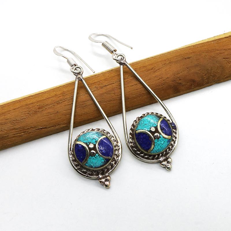 Tibetan Turquoise Handmade Choker Earrings: Tibetan Handmade Ethnic EarringsMain Stone: Turquoise & CoralMetal: Tibetan SilverMaterial: StoneBrand: HandmadeStyle: BohemianEthnic Origin: TibetanCountry/Region of Manufacture: Nepal