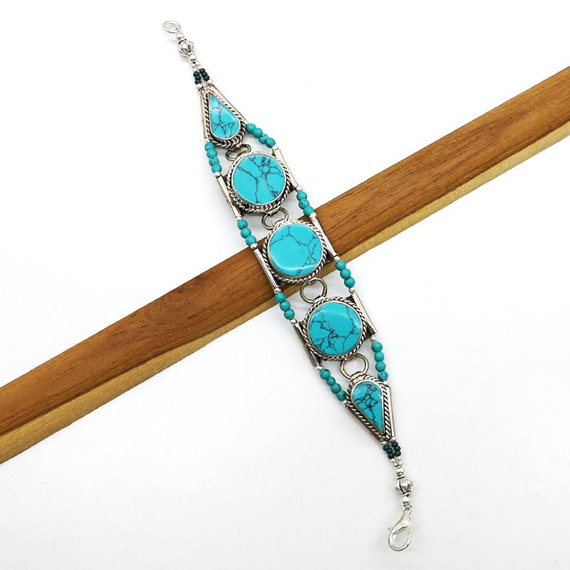 Ethnic Antique Turquoise Handmade Bracelet: TIBETAN TURQUOISE & CORAL HANDMADE BRACELETWeight: 30 Gram ApproxGemstones: Turquoise & Coral, LapisBrand: HandmadeBracelet Length: 6 to 7 InchCountry/Region of Manufacture: Kathmandu/Nepal
