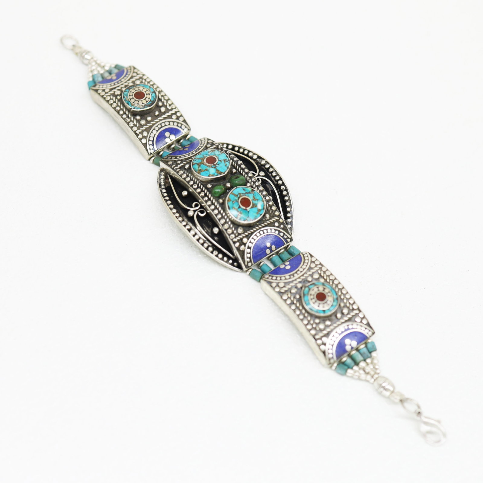 Ethnic Antique Choker Handmade Bracelet: TIBETAN TURQUOISE & CORAL HANDMADE BRACELETWeight: 30 Gram ApproxGemstones: Turquoise & Coral, LapisBrand: HandmadeBracelet Length: 6 to 7 InchCountry/Region of Manufacture: Kathmandu/Nepal