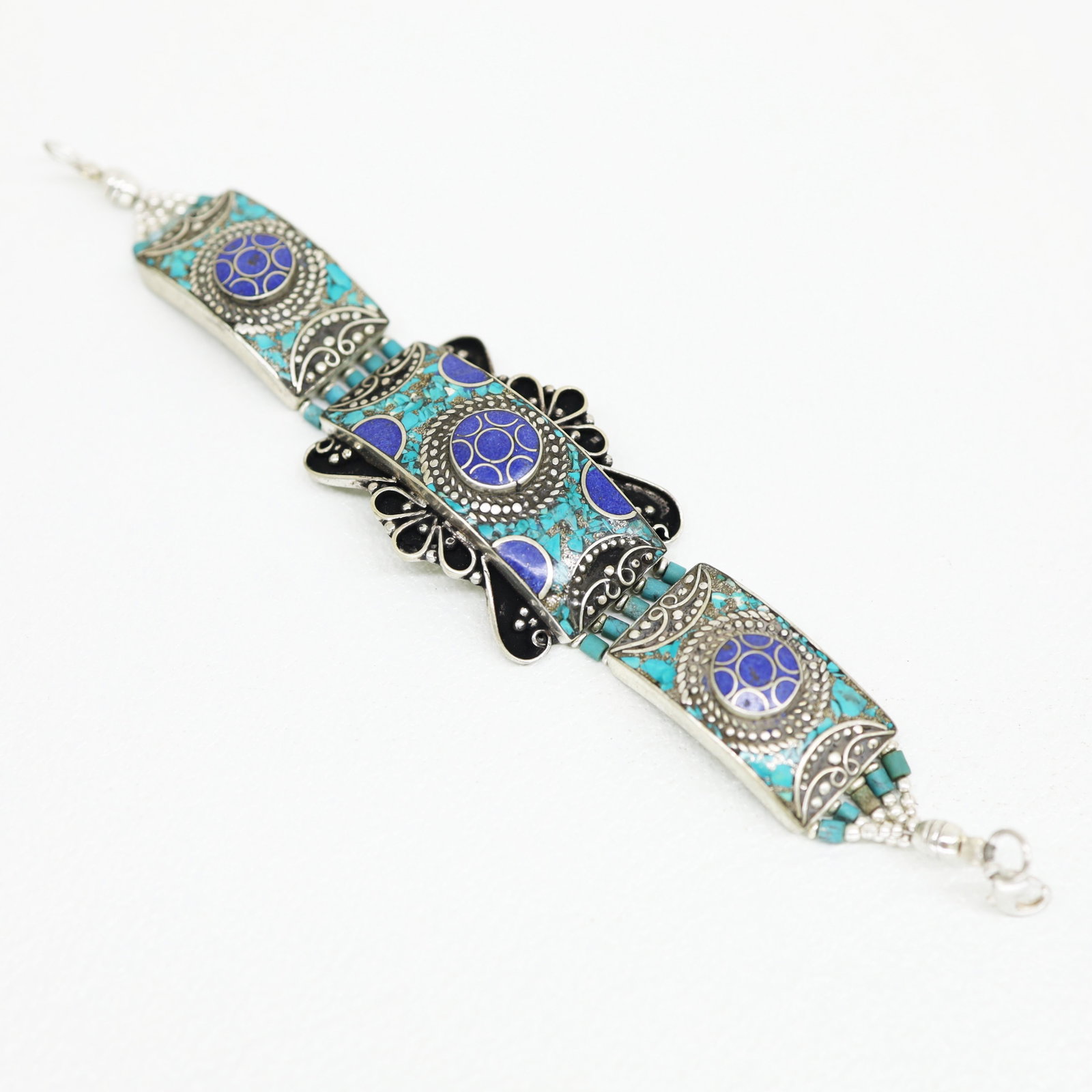 Tibetan Turquoise & Lapis Handmade Boho Bracelet: TIBETAN TURQUOISE & CORAL HANDMADE BRACELETWeight: 30 Gram ApproxGemstones: Turquoise & Coral, LapisBrand: HandmadeBracelet Length: 7 to 8 InchCountry/Region of Manufacture: Kathmandu/Nepal