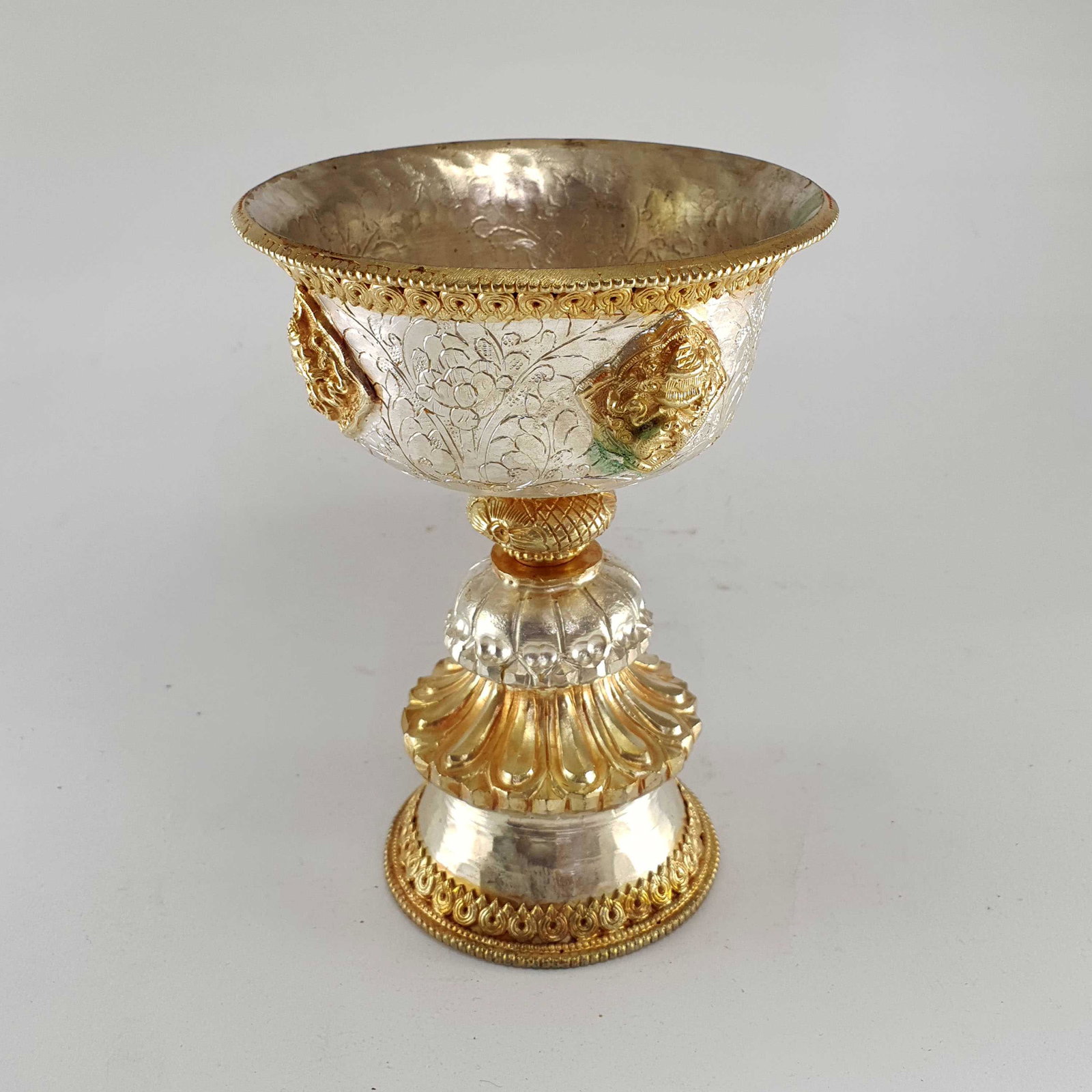 5.5" Butter Lamp, Buddhist Ritual - Gold & Silver Plated: BUTTER LAMP: Butter lamps, also known as butter lights, are found in Tibetan Buddhist temples and monasteries all across the Himalayas. Traditionally, the lamps burned clarified yak butter, but nowada